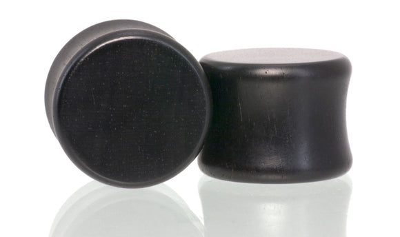 Ear gauge plugs made in Ebony wood.