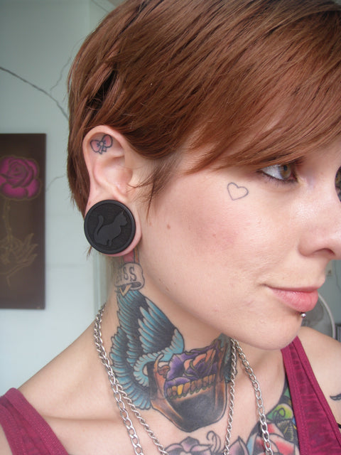 Customer wearing Eboyn wood 9 Lives styles ear gauges. 