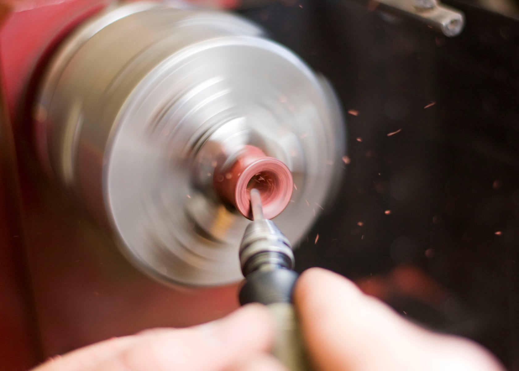 Hand carving a wood ear gauge tunnel. 