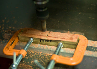 CNC machining custom wood earrings. 