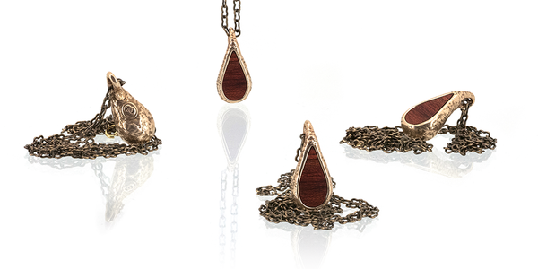 Rain drop pendants. Bronze metal with Bloodwood inlay. 