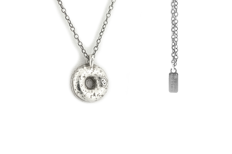 Doughnut pendant, cast in Sterling Silver with Chechen frosting and etched sprinkles. Back logo shown.