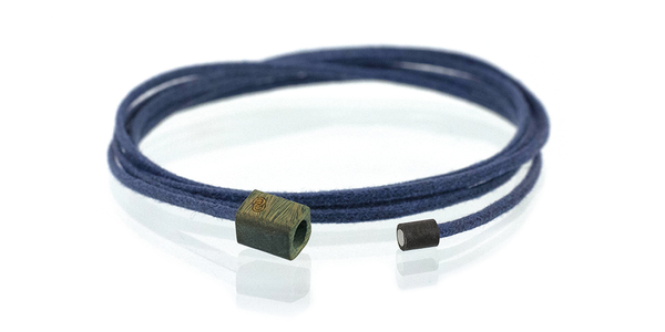 Wood bracelet. Verawood with blue cotton cord wrap. Logo shown.