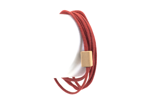 Wood bracelet. Swiss pear wood with red cotton cord wrap.