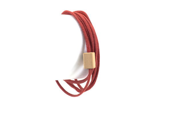 Wood bracelet. Swiss pear wood with red cotton cord wrap.