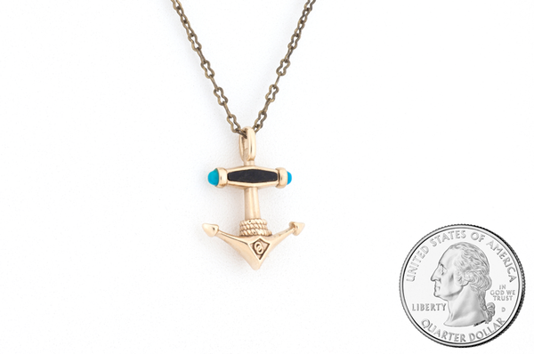 Anchor pendant necklace. In bronze and wood. Size scale. 