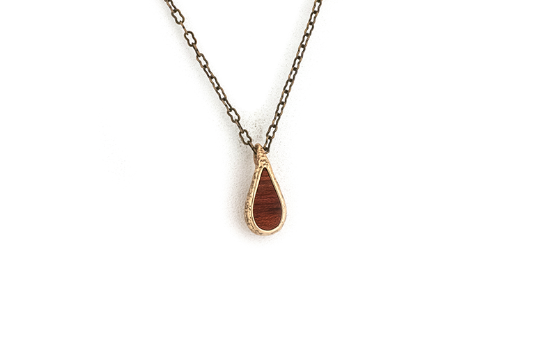 Rain drop pendant necklace. Bronze metal with Bloodwood inlay.