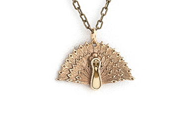 Peacock pendant made in Bronze metal with Hollywood inlay.